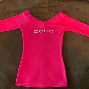 BEBE pink top.